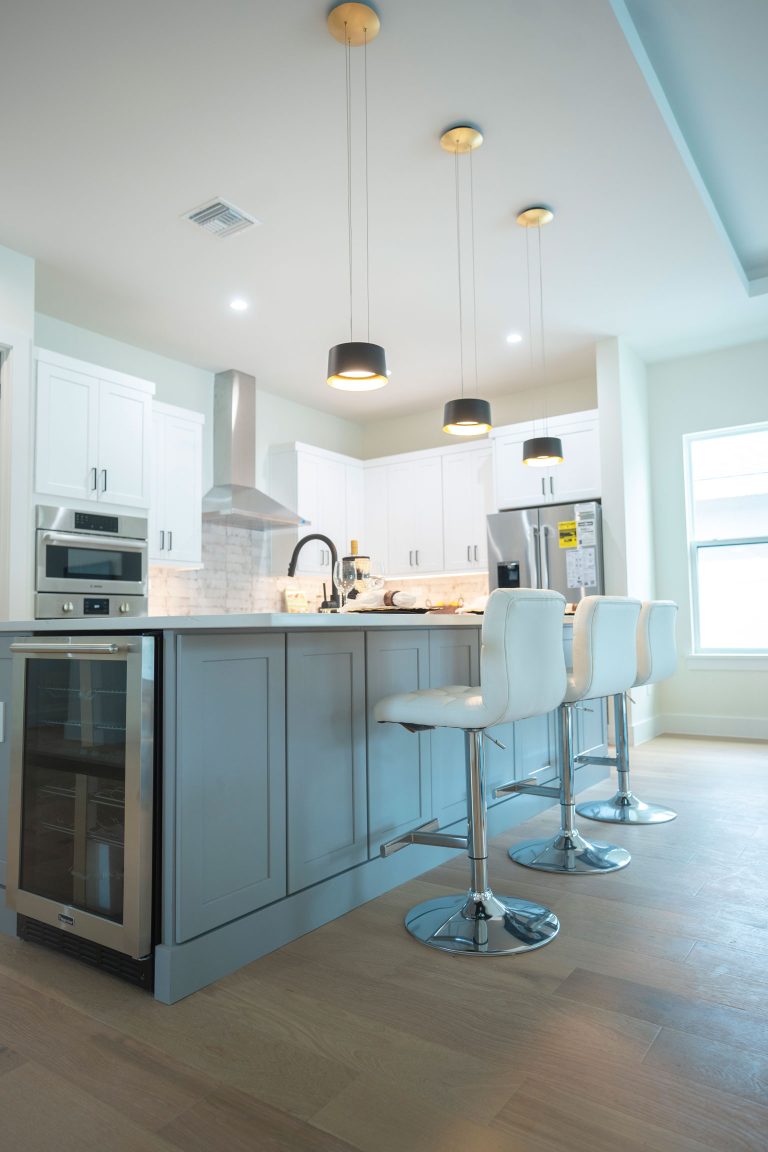 gray shaker kitchen island white bar stools