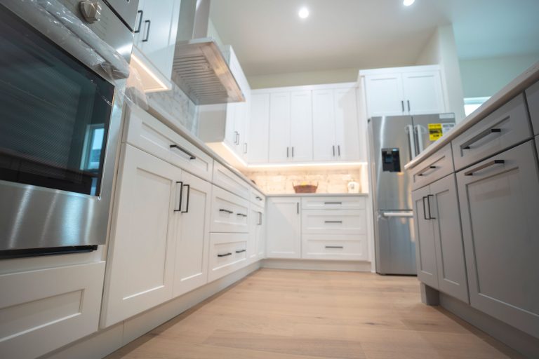 light gray island cabinet white shaker kitchen cabinets