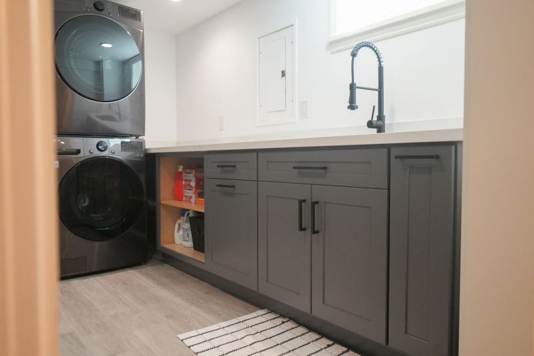 rta laundry cabinets in modern laundry room