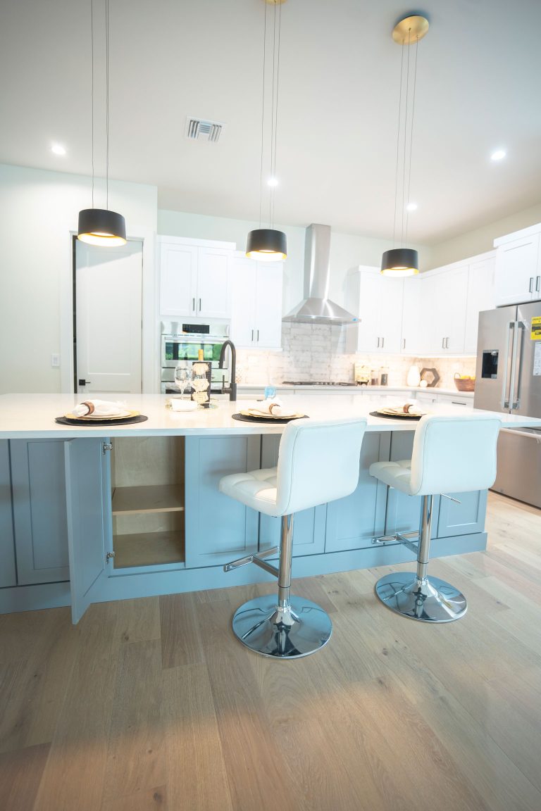 white shaker cabinets gray island cabinet pendant lights